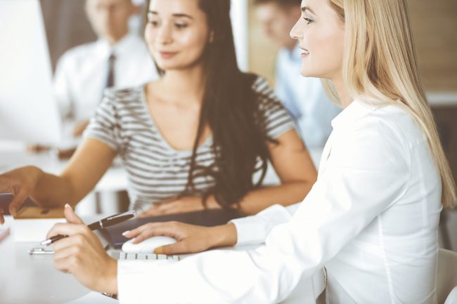 people collaborating at a computer